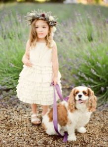 little girl dressed up with a dog