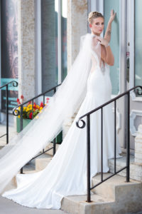 Bride posing in a cathedral veil