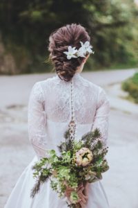 Bride with white flowers in her hair