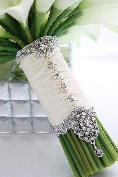bridal bouquet cuff with crystal trim, buttons and crystal brooch