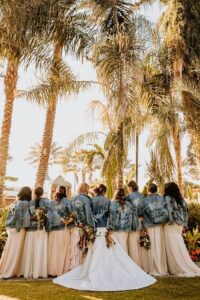 bridal party in jean jackets at a destination wedding