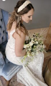 bride wearing ivory pearl headband