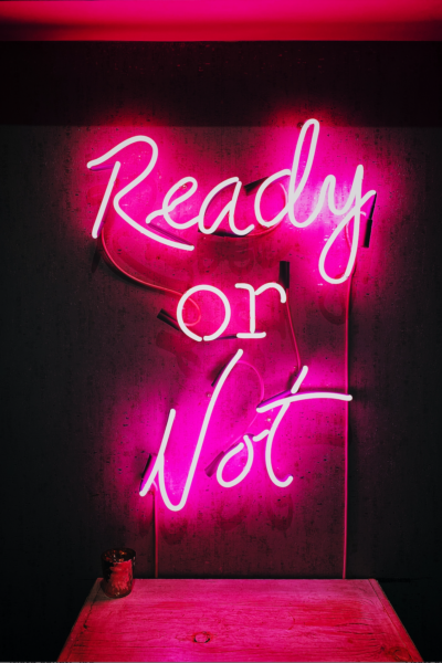neon sign photo magenta "ready or not" by Jon Tyson for Unsplash