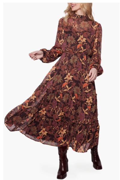 woman wearing long sleeved floral midi dress