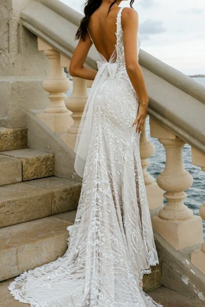 model wearing a wedding gown on historic outdoor stairway
